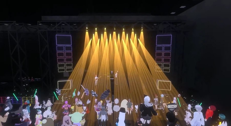 メタバース上のライブ会場に集まった多数のアバターが、ステージを演奏するアバターを見上げている様子